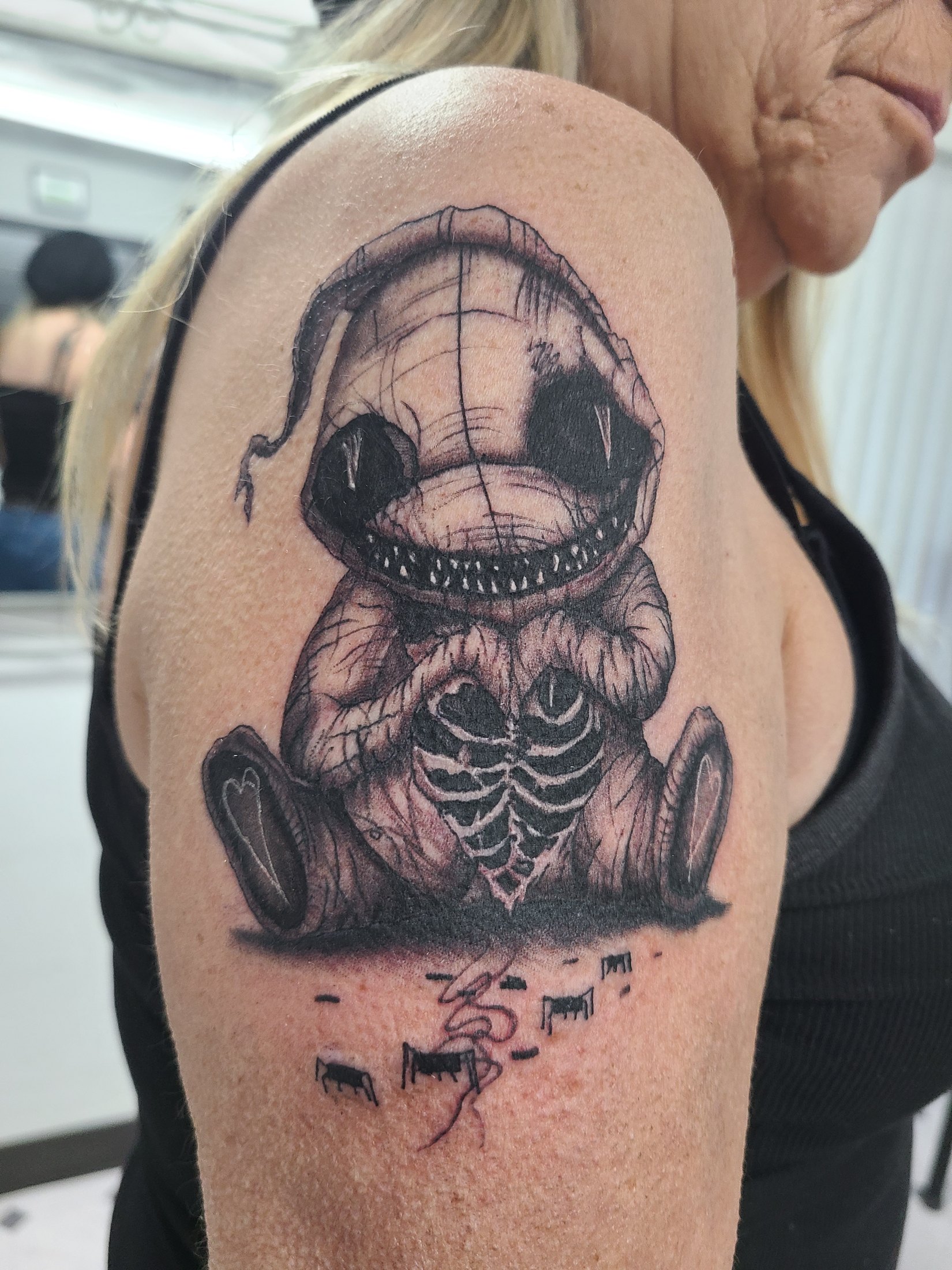 Black and grey skeleton character tattoo by Social Suicide Tattoos in Pahrump, Nevada