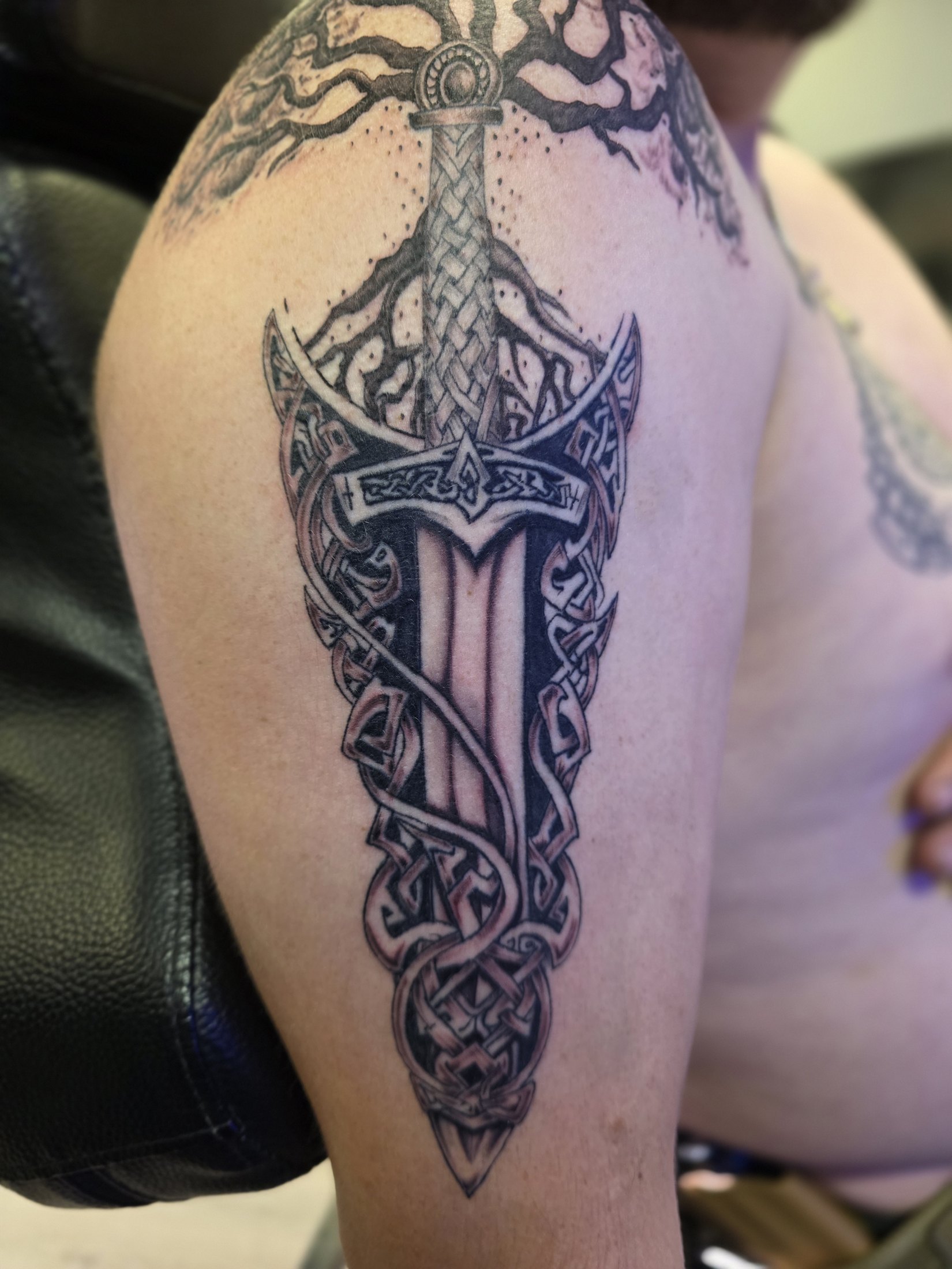 Black and grey ornamental dagger tattoo by Social Suicide Tattoos in Pahrump, Nevada
