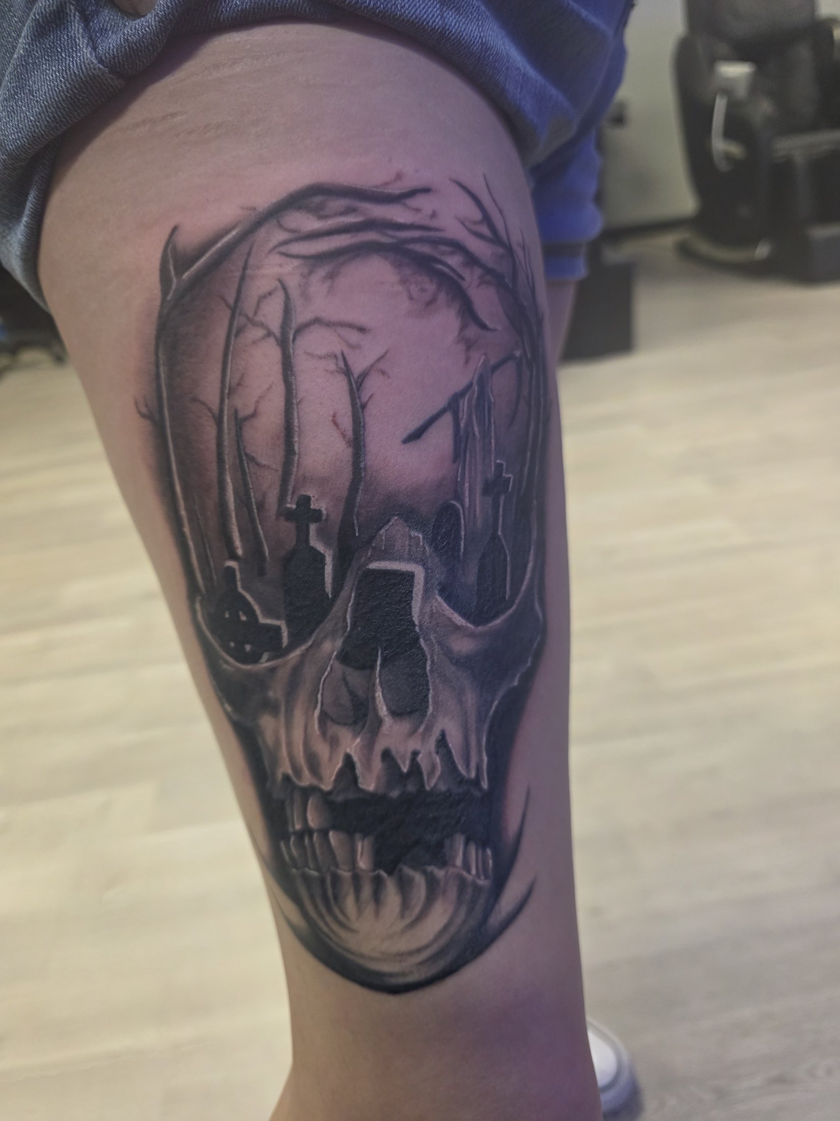Black and grey skull tattoo by Social Suicide Tattoos in Pahrump, Nevada