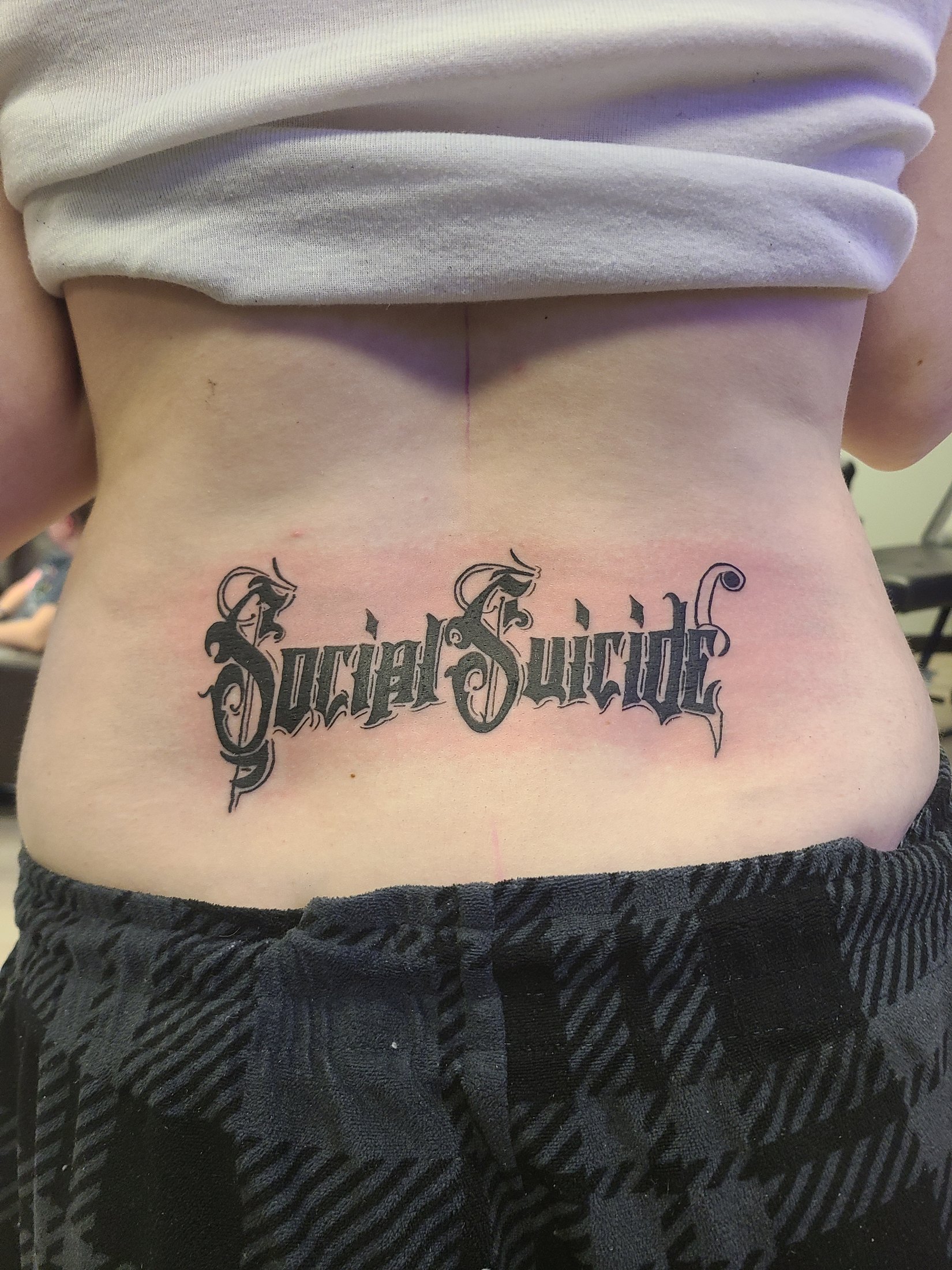 Blackletter script tattoo by Social Suicide Tattoos in Pahrump, Nevada