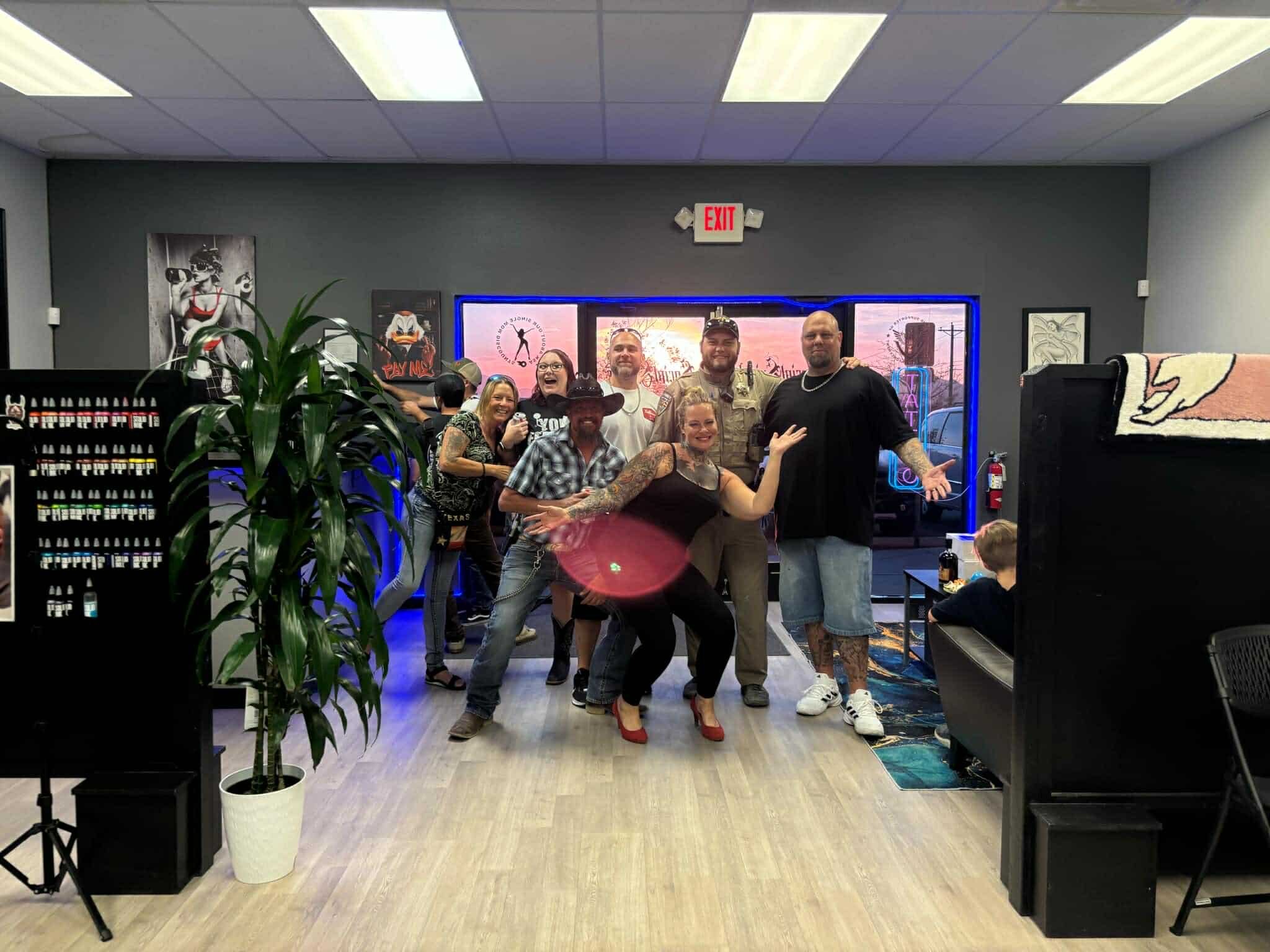 Inside Social Suicide Tattoos in Pahrump, Nevada with clients and shop crew